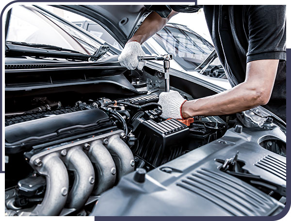 Mechanic Working on Car